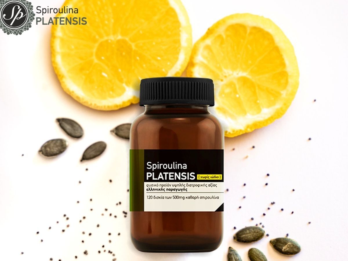 Δύο φέτες πορτοκάλι, κολοκυθόσπορος και Spiroulina PLATENSIS Σε Ταμπλέτες