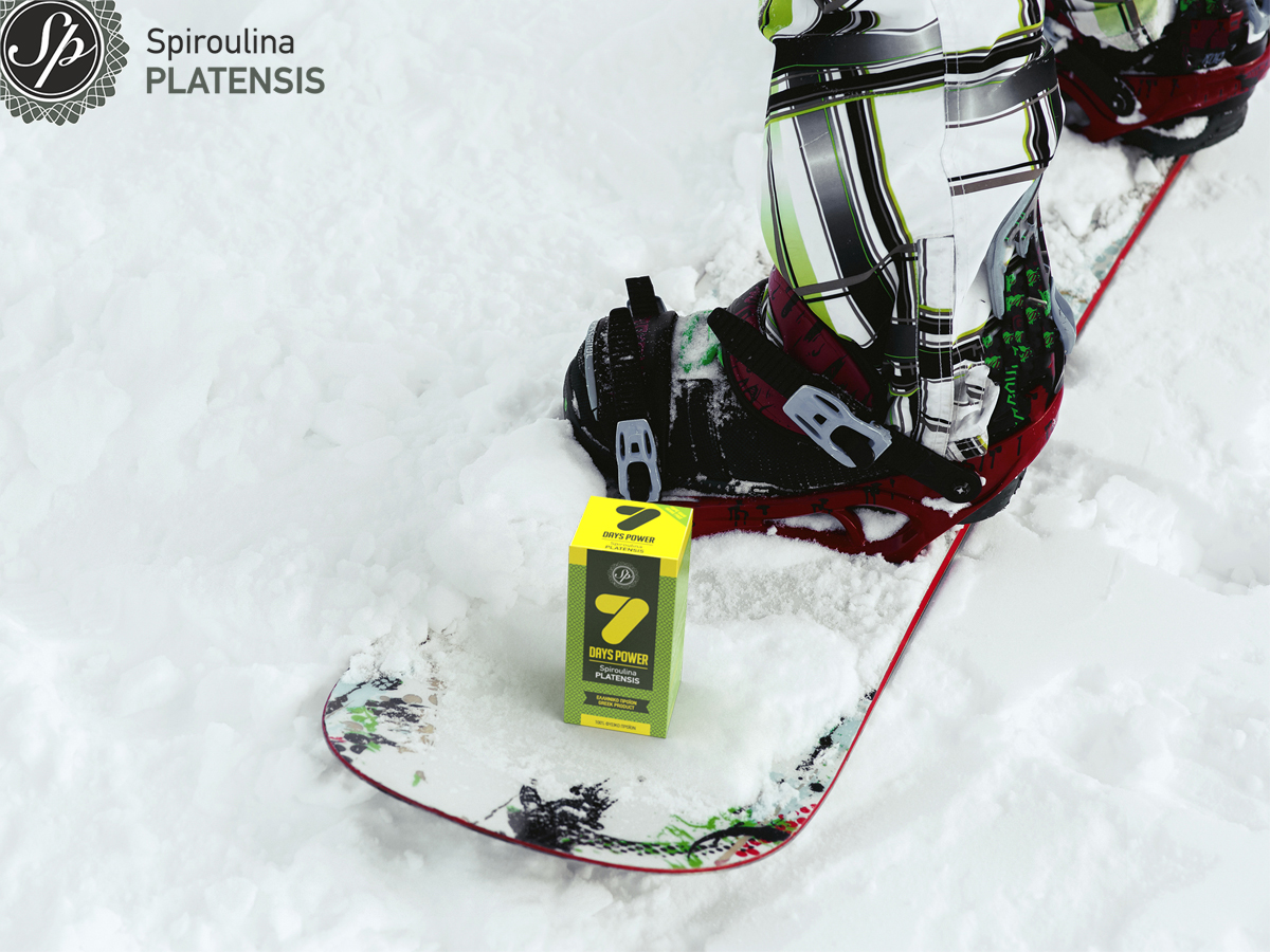 snowboard στα χιόνια με μία συσκευασία 7 Days POWER by Spiroulina PLATENSIS